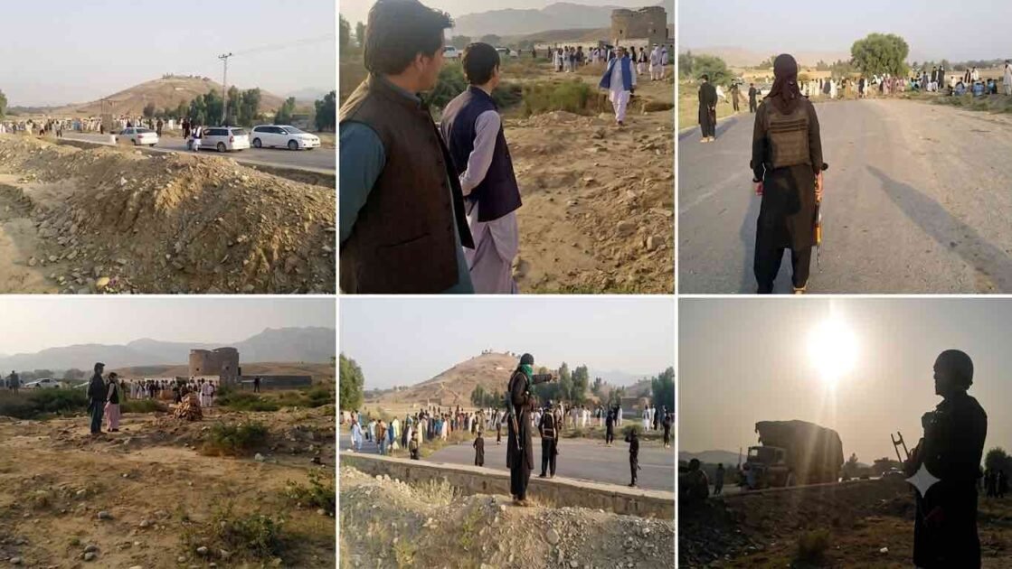 Crowds of local tribesmen and security personnel along the blocked Bannu-Miranshah road in North Waziristan.