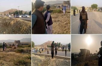 Crowds of local tribesmen and security personnel along the blocked Bannu-Miranshah road in North Waziristan.