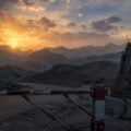 Pak-Afghan border tension and mountainous landscape at sunset