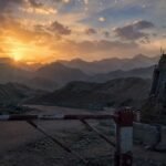 Pak-Afghan border tension and mountainous landscape at sunset