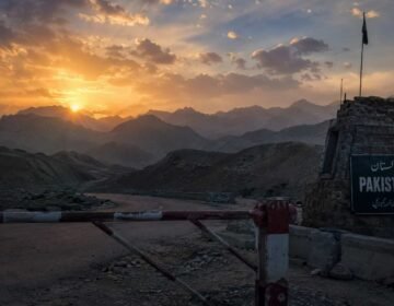 Pak-Afghan border tension and mountainous landscape at sunset