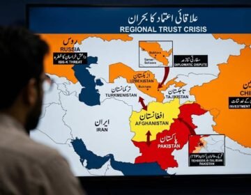 A newsroom analyst views a large digital screen displaying a map of Central and South Asia. Afghanistan is highlighted in yellow, Pakistan in red, and neighboring countries in orange. Arrows indicate tensions radiating from Afghanistan. Several bilingual (Urdu/English) text boxes highlight regional security and diplomatic threats, including ISIS-K and TTP, under the title 'Regional Trust Crisis'.