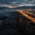 "Dramatic mountain border crossing with barbed wire in the foreground, contrasting a modern, illuminated CPEC industrial highway with dark, shadowy mountain terrain."