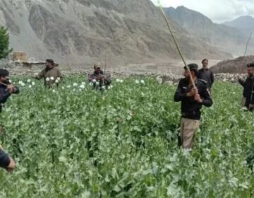 Security forces and police vehicles deployed in Chilas, Gilgit-Baltistan, following an armed attack on a police team during an opium eradication operation, branded by The Khyber Times.