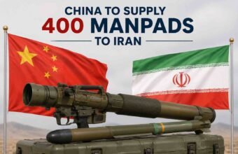 Illustration of portable air defense systems with Chinese and Iranian flags representing reports of a possible MANPADS shipment.