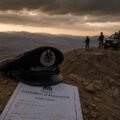 English: Balochistan Police cap on a rocky landscape, symbolizing the security inquiry in Ziarat.زیارت سکیورٹی انکوائری کی علامت کے طور پر چٹانی علاقے پر بلوچستان پولیس کی ٹوپی