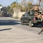 Police personnel secure the Khazina Banda check post in Hangu after a deadly drone-assisted militant attack.