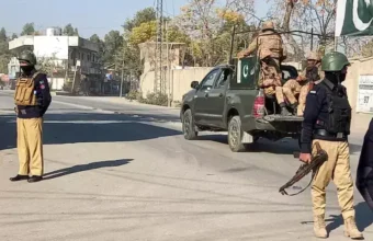 Police personnel secure the Khazina Banda check post in Hangu after a deadly drone-assisted militant attack.