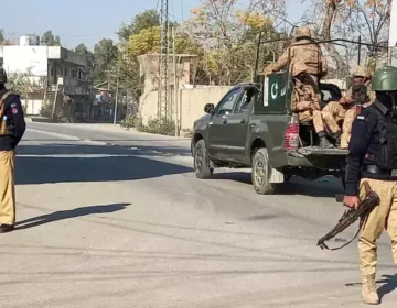 Police personnel secure the Khazina Banda check post in Hangu after a deadly drone-assisted militant attack.