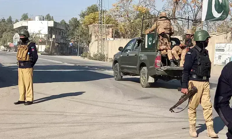 Police personnel secure the Khazina Banda check post in Hangu after a deadly drone-assisted militant attack.