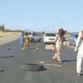 English: Blockade on Balochistan highway with rocks and tires during security crisis