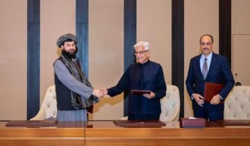 Pakistani Defence Minister Khawaja Asif shaking hands with Afghan Acting Defence Minister Mullah Mohammad Yaqoob during high-level bilateral security talks