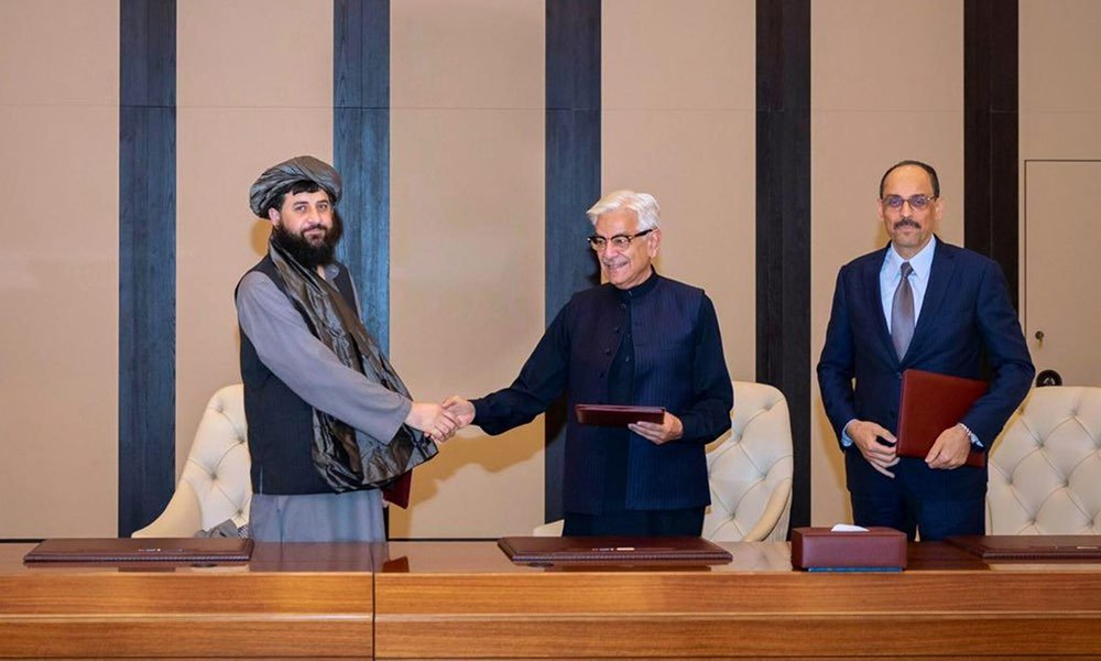 Pakistani Defence Minister Khawaja Asif shaking hands with Afghan Acting Defence Minister Mullah Mohammad Yaqoob during high-level bilateral security talks