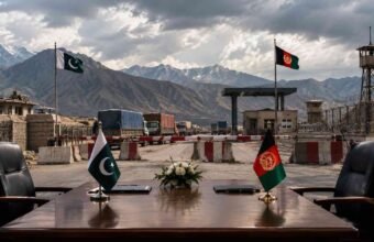 Pakistan-Afghanistan border crossing point with a negotiating table.