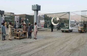 Closed main border gate and local individuals at the Pak-Afghan Torkham border