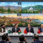 Wide photograph of a multilateral diplomatic press conference featuring Afghan, Pakistani, Chinese, and Turkish officials. Numerous press photographers are in the foreground, and a large multi-panel video screen in the background shows illustrative scenes of Kabul, Islamabad, Beijing, and Istanbul.