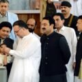 KP Health Minister Khaliq-ur-Rehman administering polio drops to a child to inaugurate the anti-polio campaign at Services Hospital, Peshawar.