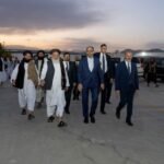 Turkish Intelligence Chief Ibrahim Kalin and Turkish delegates walking on the Kabul airport tarmac alongside Afghan Taliban officials.