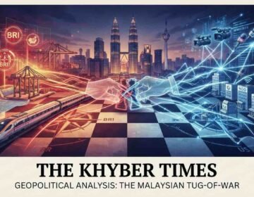 A cinematic digital illustration for "The Khyber Times" titled "THE MALAYSIAN TUG-OF-WAR," visualizing geopolitical competition on a giant chessboard over the Kuala Lumpur skyline. The left side glows with red and gold Chinese Belt and Road Initiative infrastructure (trains, ports, dams). The right side glows with blue US media and NGO network symbols. They meet in a tangle over the city center.