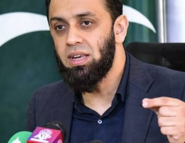 Federal Minister for Information Attaullah Tarar addressing the media.