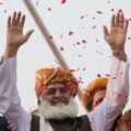 JUI-F Chief Maulana Fazlur Rehman addressing the Wahdat-e-Ummat conference in Karachi alongside a public protest in Lahore expressing solidarity with Saudi Arabia.