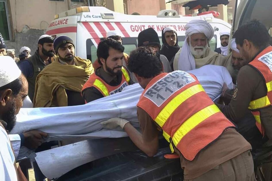 Rescue 1122 personnel and local residents carrying out relief operations following the attack on a traffic police mobile in Tank.