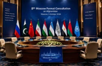 Empty diplomatic conference hall prepared for the 8th Moscow Format Consultation on Afghanistan, with Pakistan, Russia, China, Iran, Tajikistan, Uzbekistan, the Islamic Emirate of Afghanistan and other participating flags displayed behind vacant chairs.